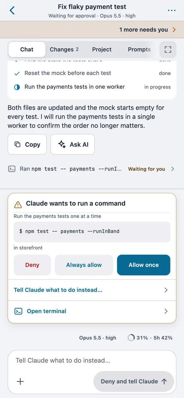 A session chat on the phone with a card asking to allow the command npm test.